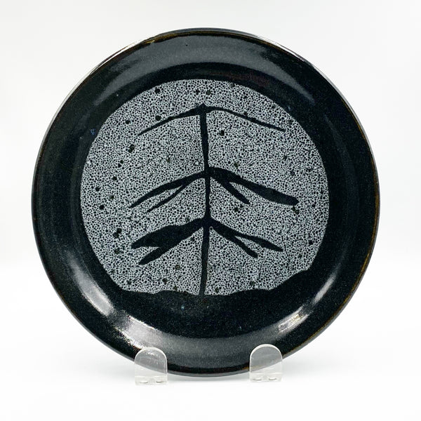 Ceramic plate with tree design